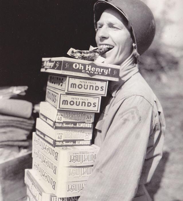 American GI with candy rations, 1944
